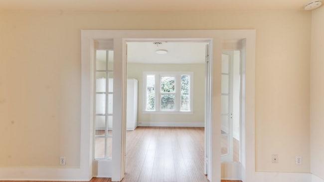 Building Photo - Charming 2 Bedroom 1 Bathroom Bungalow with Oversized 1 Car Garage and Large Manicured  Backyard ...