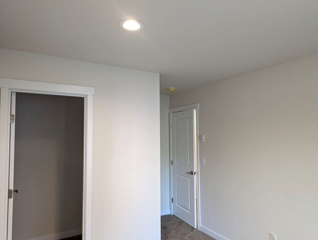 Building Photo - Brand New Three-Bedroom Townhomes, 1/2 a m...