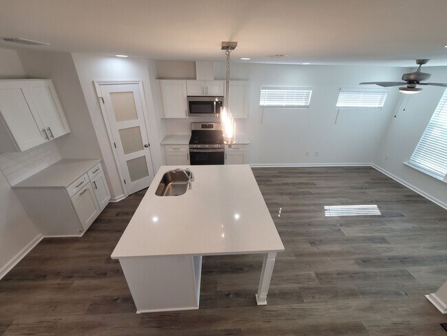 Building Photo - NEWER CONSTRUCTION! Modern NE 3/2.5 w/ Stainless Steel Appliances, Granite Counters, Washer, Drye...