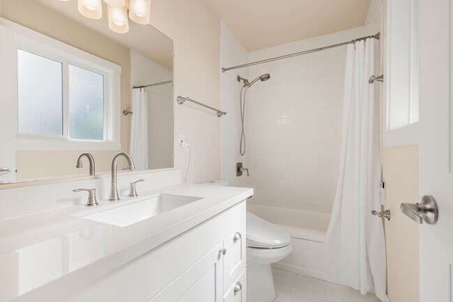 Building Photo - Updated Split-Level Home with Flexible Living Spaces & Backyard Deck