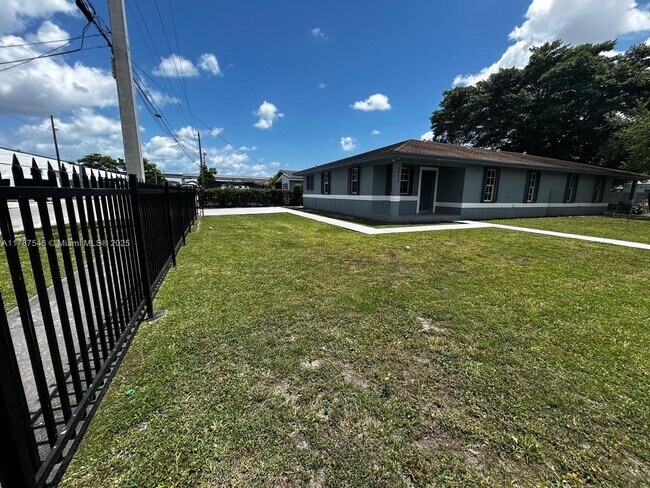 Building Photo - 6093 NW 29th Ave