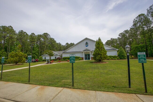 Building Photo - "Spacious 4-Bedroom Gem with 2.5 Baths at ...