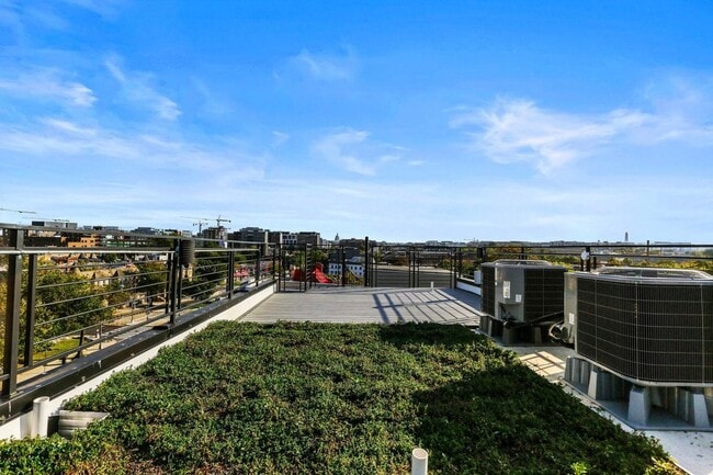 Building Photo - Private Double Decker Rooftop! - Modern Lu...