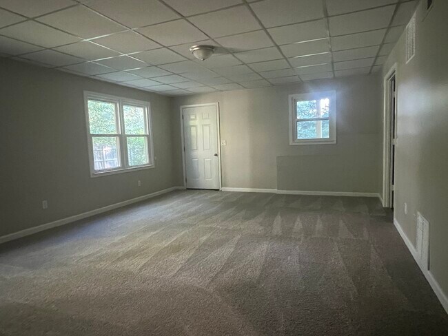 basement with door to backyard - 1221 Settlebench Ln NW