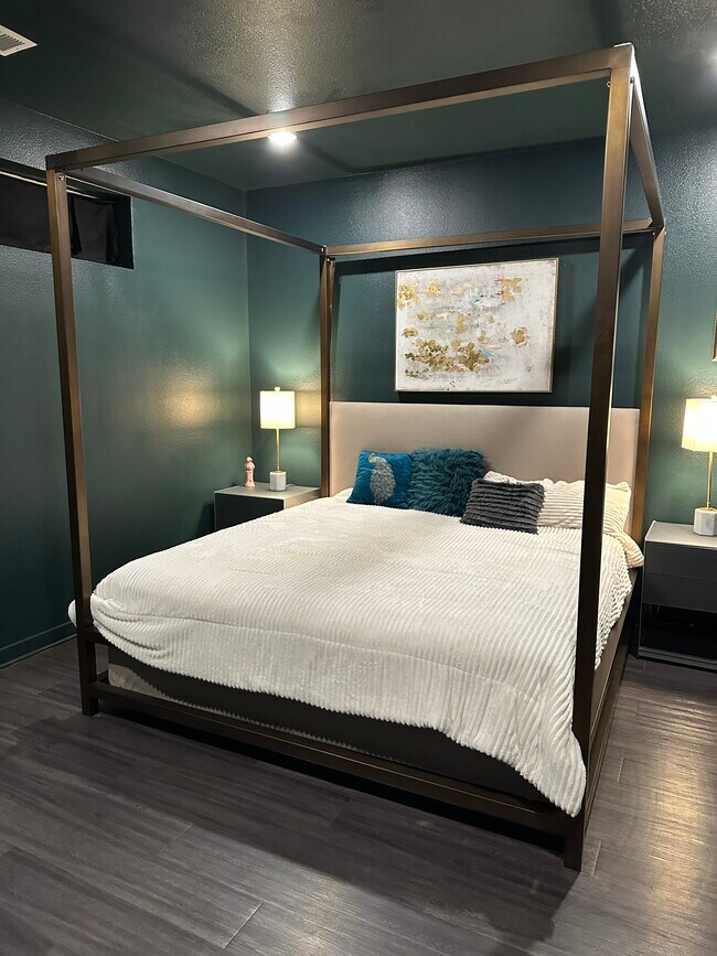 Large bedroom will hold a king size bed and a full size desk. - 4361 S Congress Ave