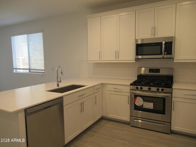 Building Photo - 5834 N 90th Dr