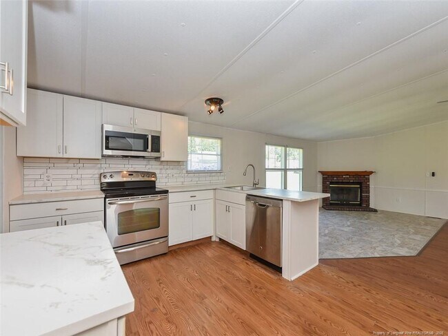 Building Photo - 6124 Heath Hawkins Ct