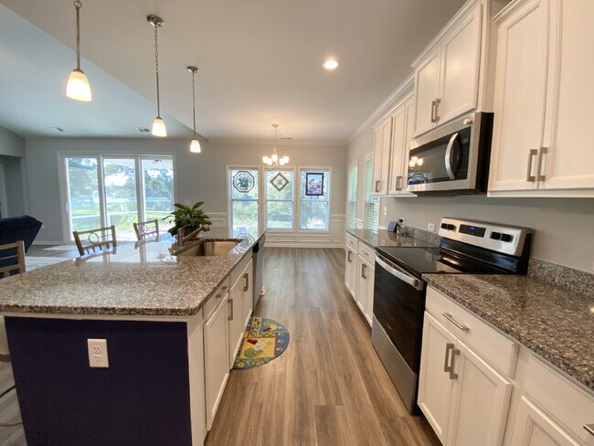 Building Photo - Welcome to Lake Life! Four Bedroom, Single...