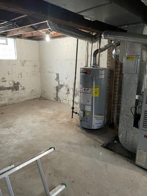 Furnace and Hot Water Tank in Basement - 108 Malden Rd