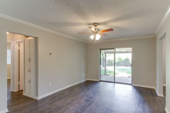 Building Photo - No Carpet! Great tree shaded yard!