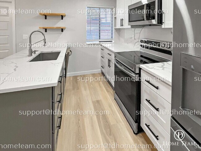 Building Photo - "Charming 3-Bedroom Retreat with Cozy Fire...