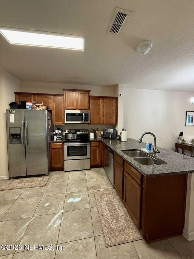Building Photo - 705 Servia Dr