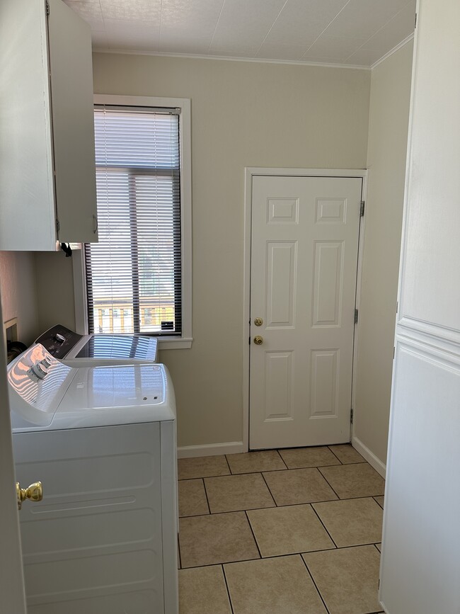 Separate Laundry Room withFull size Washer Fryer, 10 -Clear Glass Panel door, with borrowed light., - 1271 10th Ave