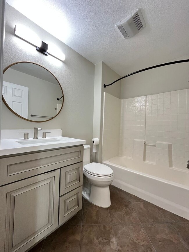 Building Photo - PICTURE PERFECT!  3 BR/3 BA END UNIT CONDO with DIRECT ACCESS 2 CAR GARAGE