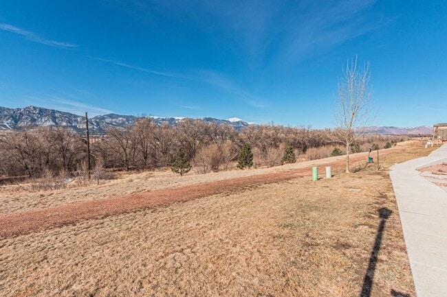 Building Photo - Cozy Fully Furnished  COS Townhome