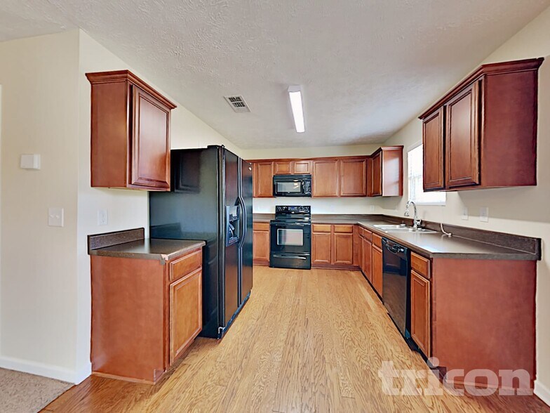 Building Photo - 1009 Harmony Ln