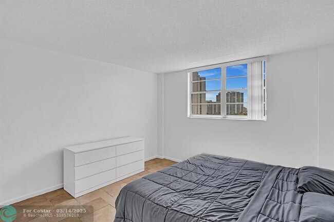 Building Photo - 19390 Collins Ave