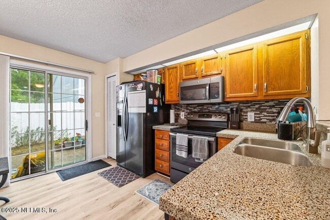 Building Photo - 9545 Glenn Abbey Way