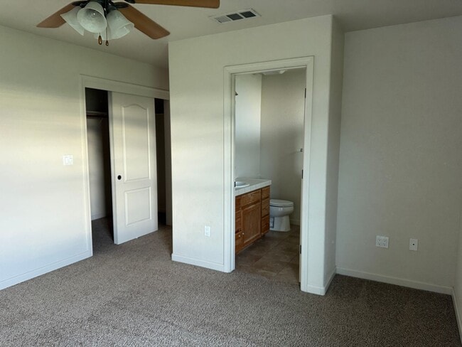 Building Photo - NOW AVAILABLE!! BEAUTIFUL GUSTINE HOME LOCATED IN GATED COMMUNITY