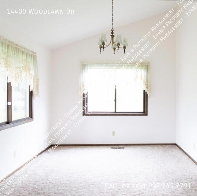 Building Photo - 14400 Woodlawn Dr