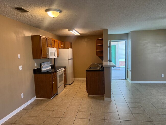 Building Photo - 3806 Maypop Cir