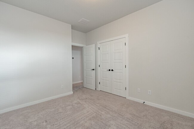 Building Photo - Spacious Buda Beauty Offering Open-Concept Living and Flexible Space for Every Lifestyle!