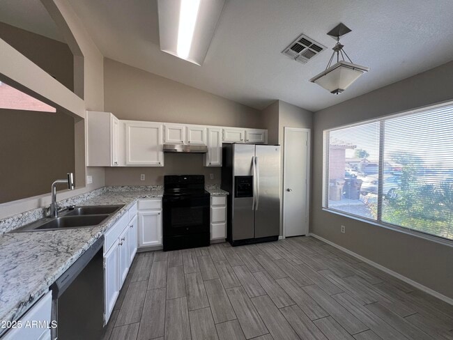 Building Photo - 8631 N 112th Ave