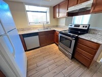 Building Photo - SPACIOUS 2bed/2bath CONDO ON FIRST FLOOR