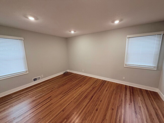 Building Photo - Spacious 4-Bedroom Home with Pond Views & EV-Ready Garage – Bloomington!!