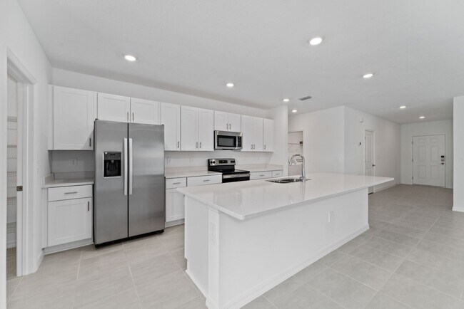 Building Photo - Almost New 4/3.5 Home with Waterview and 2...