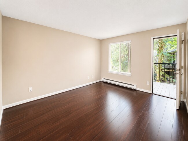 Building Photo - Modern Wooded Condo with Upgraded Kitchen & Private Deck