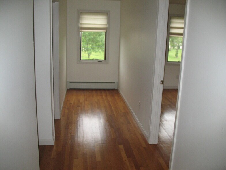 upstairs hall - 4A Romano Village Dr
