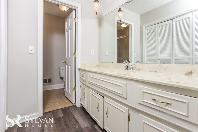 Building Photo - Come view this charming brick home