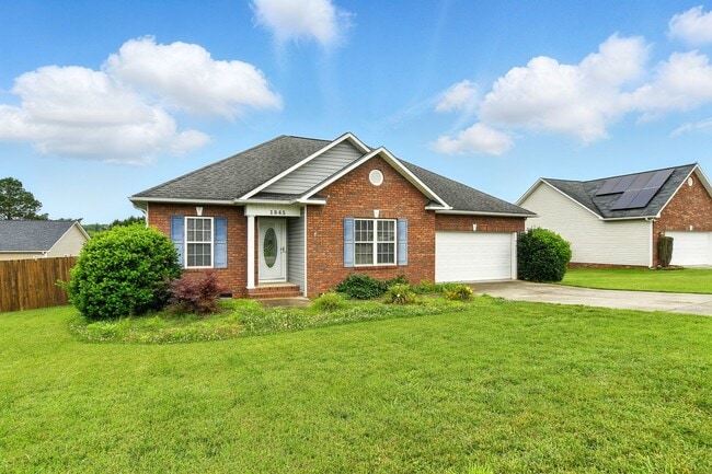 Primary Photo - Charming 3BR Brick Home with Private Yard ...