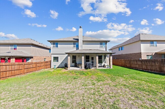 Building Photo - Spacious 5-Bedroom Home with Granite Count...