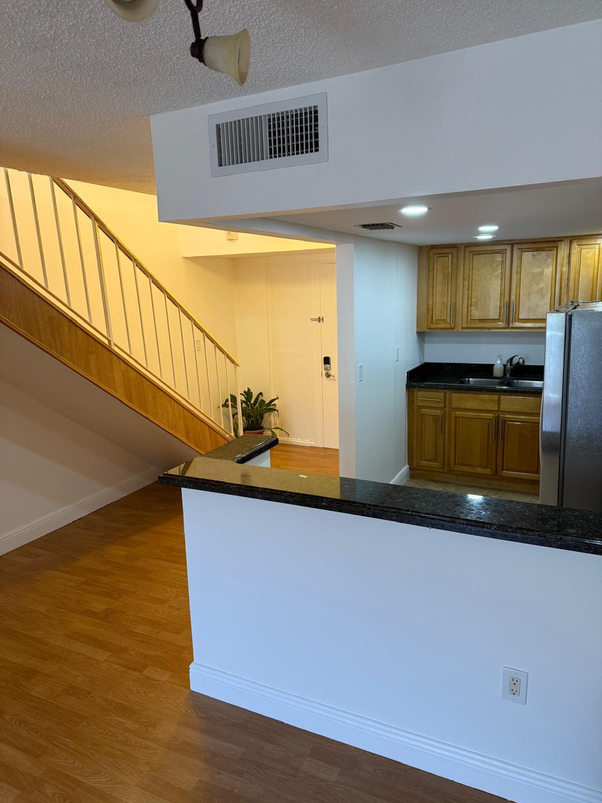 Kitchen looking into entryway - 9365 Fontainebleau Blvd