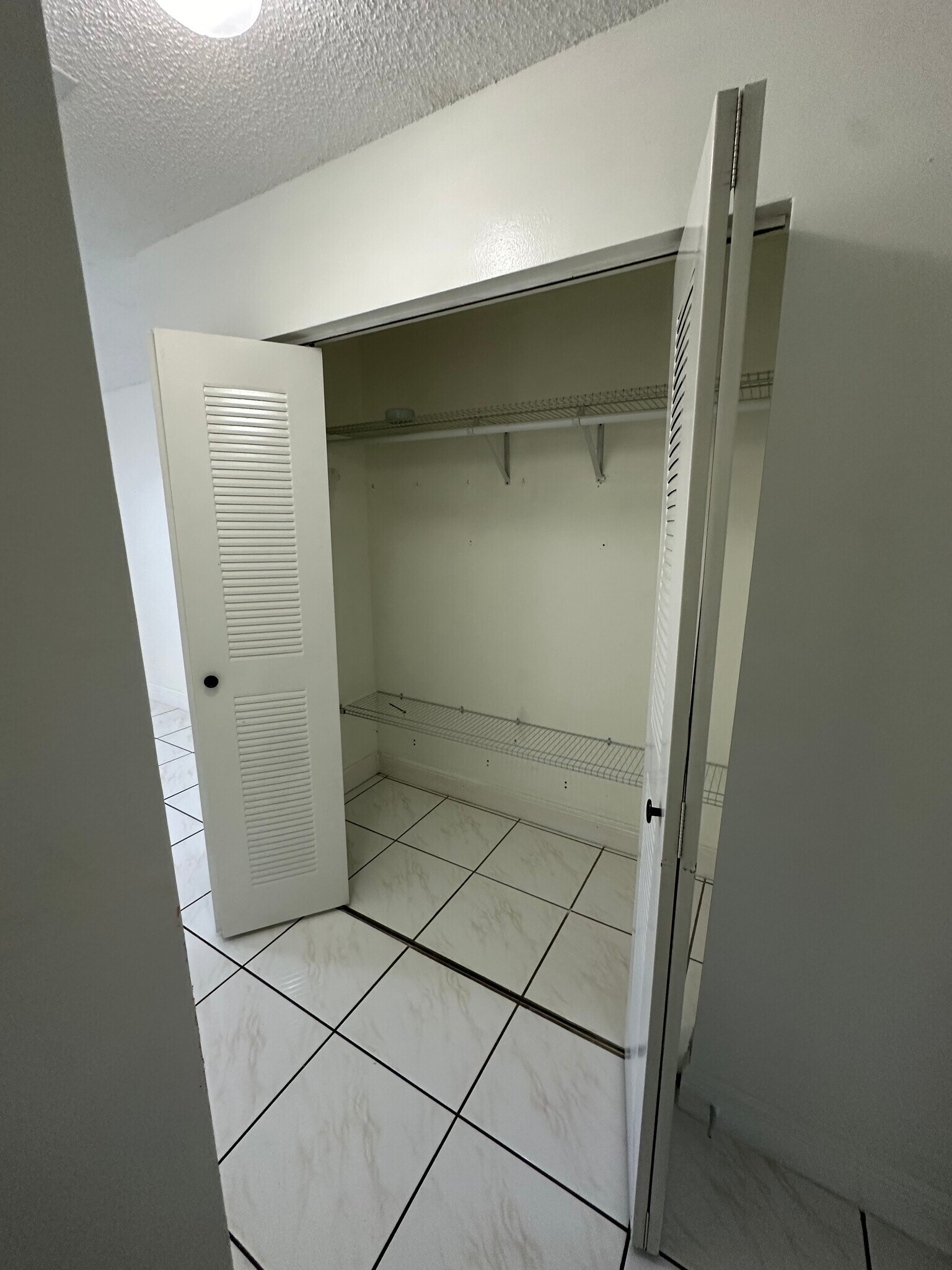 Master bedroom 1st closet - 8851 NW 119th St