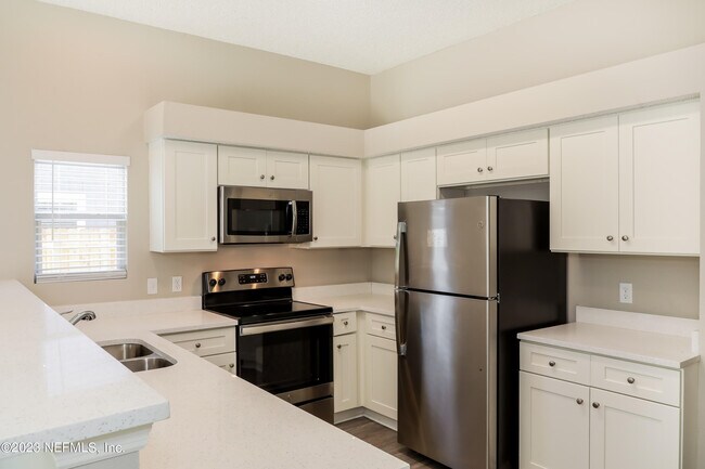 Building Photo - 7871 Moss Pointe Trail E