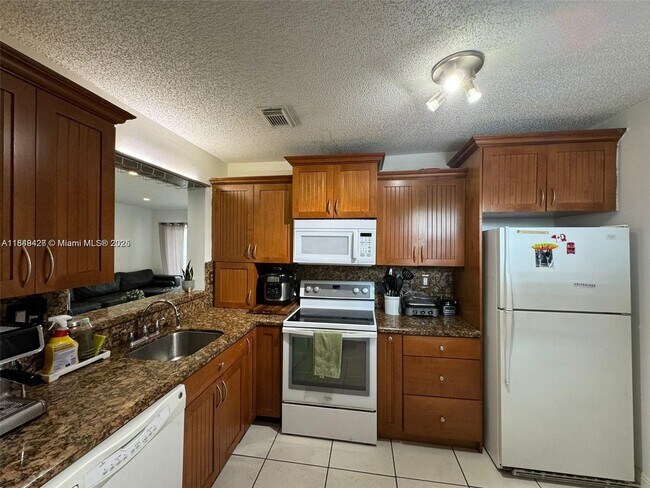 Building Photo - 4768 NW 114th Ave