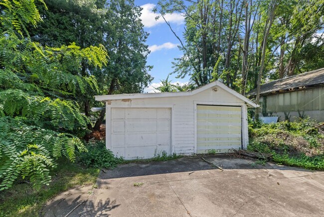 Building Photo - Classic Goodyear Heights Colonial — Hardwood, Arched Dining, Garage + Big Basement