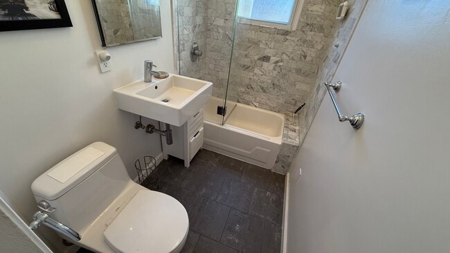 Building Photo - EPIC REA- Outstanding NOPA Location w/Garage Parking - 2 BR/1 BA Condo