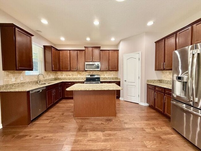 Building Photo - SPACIOUS Two Story Beautiful 5/4 Home in The Enclave At Aloma!