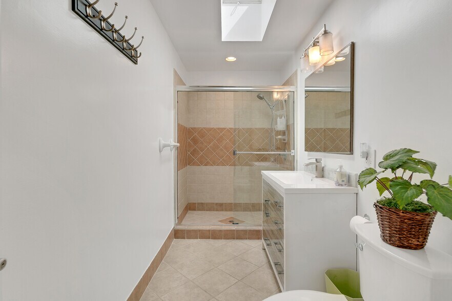 Large bathroom with shower, vanity - 32702 Seven Seas Dr