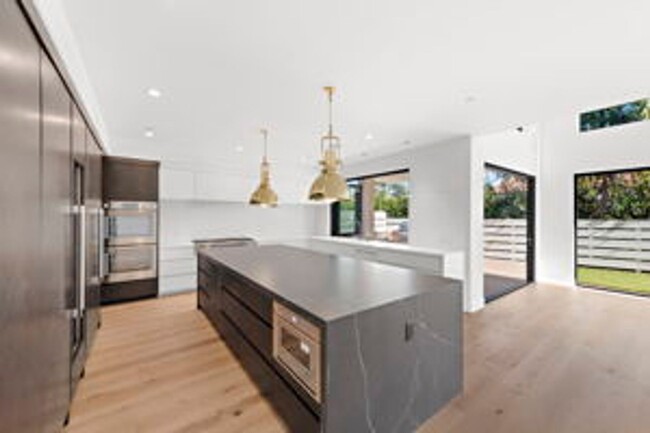 Building Photo - Brand New build offering Elegance and Soph...