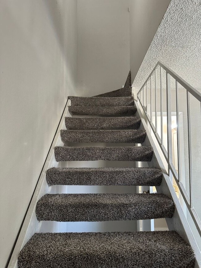 Building Photo - Three bedroom townhome with 2 car garage a...