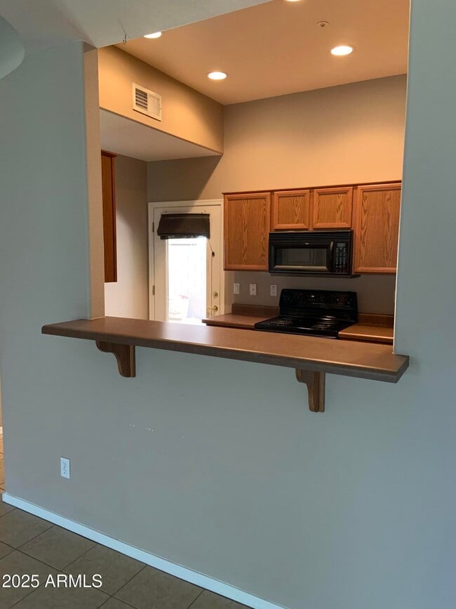 Building Photo - 7977 W Carolina Dr