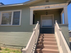 Building Photo - Fully gated Charming craftsman Two bedroom...