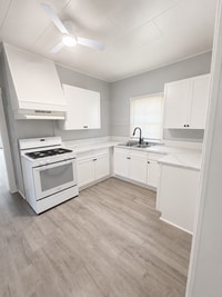 Building Photo - Private yard and parking, spacious updated interior. Don't miss out.
