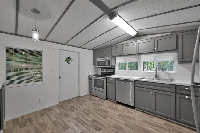 Building Photo - 6432 Longmire Rd