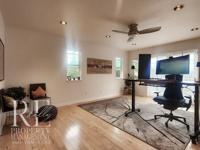 Building Photo - Light-Filled View Home with Vaulted Ceilings & Warm Wood Finishes